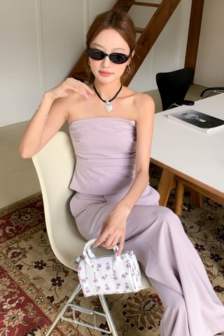HER FLARE TUBE TOP IN YAM