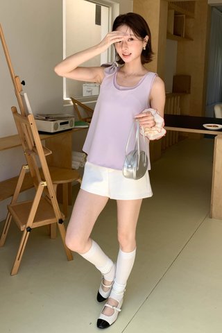 HER BOW FLARE TOP IN LILAC
