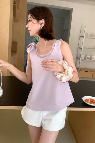 HER BOW FLARE TOP IN LILAC