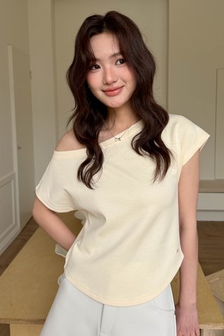 YURA DAILY ONE-SHOULDER TOP IN BUTTER CREAM